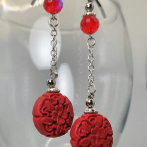 Chain and carved red beads